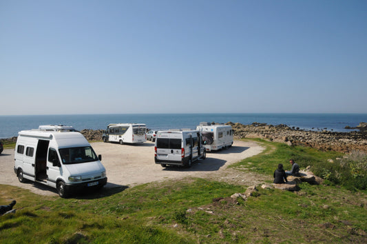 Socially distancing motorhomers on Normandy coast