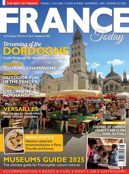 Magazine cover featuring a cityscape with people and outdoor activities, titled 'France Today'.