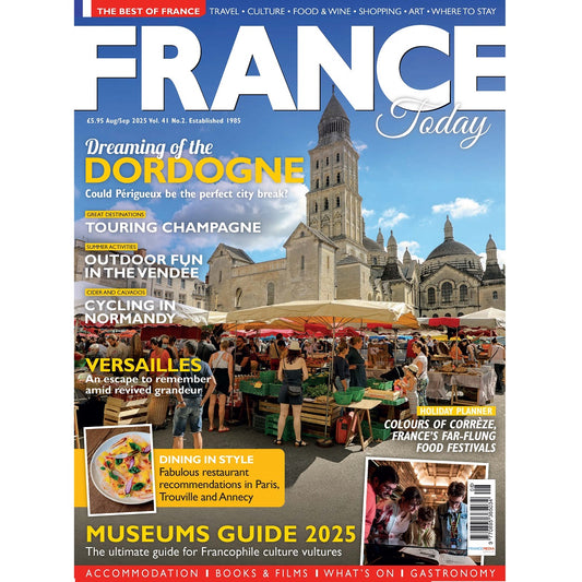 Magazine cover titled 'France Today' August September 2025  featuring a market scene and architectural landmarks.